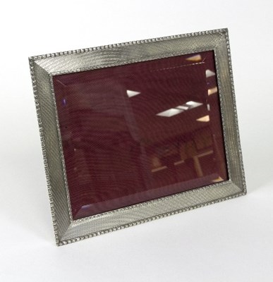 Lot 492 - A silver photograph frame, Asprey & Co.,...