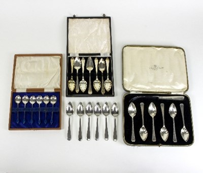 Lot 503 - A cased set of six silver grapefruit spoons,...