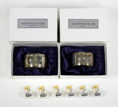 Lot 513 - A set of eight silver napkin rings, Mappin &...