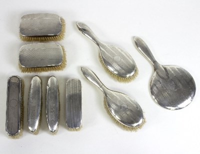 Lot 514 - A silver backed dressing table set, R & Co.,...