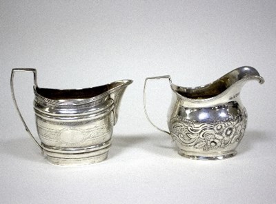 Lot 516 - A George III silver jug, Peter, Ann and...