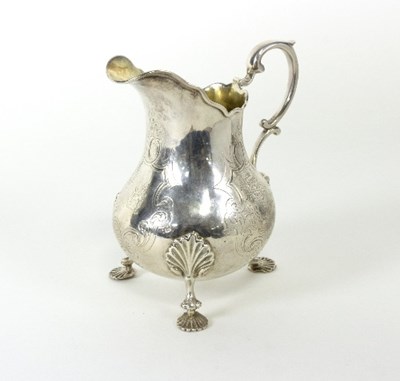 Lot 531 - A Victorian silver jug, WM, London 1853, of...