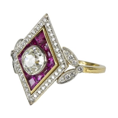 Lot 546 - An Art Deco style diamond and ruby ring, the...