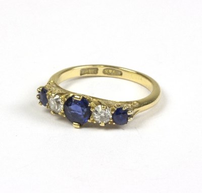 Lot 577 - A sapphire and diamond five-stone ring, in an...