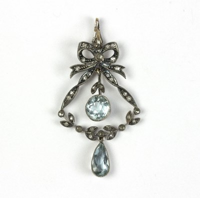 Lot 580 - An Edwardian aquamarine and diamond pendant of...