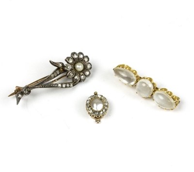 Lot 587 - A diamond floral spray brooch, a moonstone...