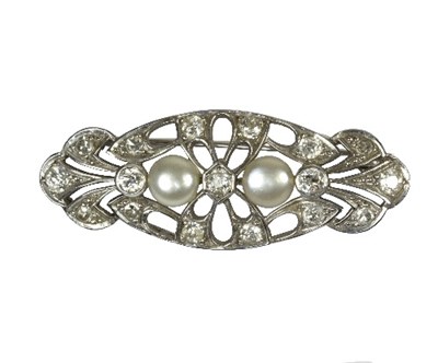 Lot 589 - A diamond and pearl openwork brooch of oval...