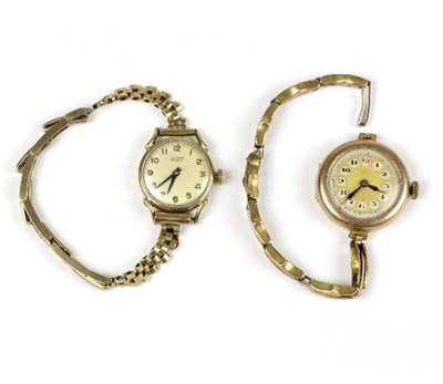 Lot 594 - A 9ct gold cased wristwatch, the circular dial...