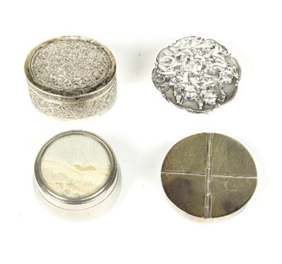 Lot 610 - A circular pill box marked Sterling, with four...