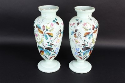 Lot 626 - A pair of green glass lustres, painted flowers,...