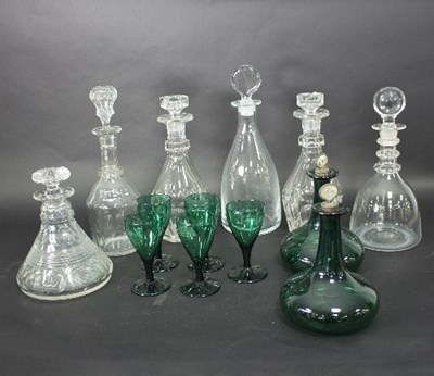 Lot 635 - A pair of green glass decanters with mother-of-...