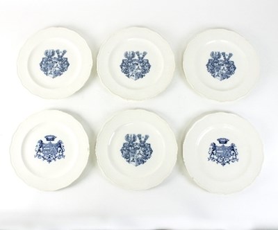 Lot 658 - A set of four and two Cauldon armorial plates...