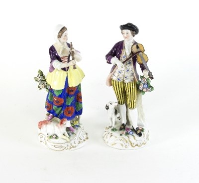 Lot 684 - A pair of Continental porcelain figures of...