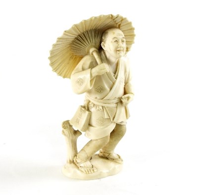 Lot 701 - A Japanese carved ivory okimono, Meiji period,...