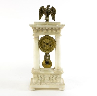 Lot 711 - An alabaster and gilt metal mantel clock with...