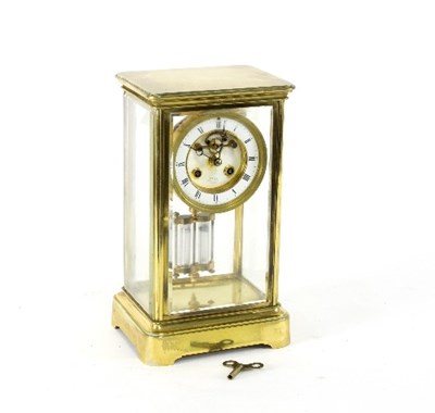 Lot 719 - A four-glass regulator in a gilt brass case,...