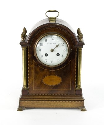 Lot 721 - An Edwardian mahogany eight-day mantel clock...