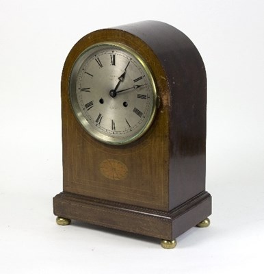 Lot 737 - An Edwardian mantel clock, the arched inlaid...