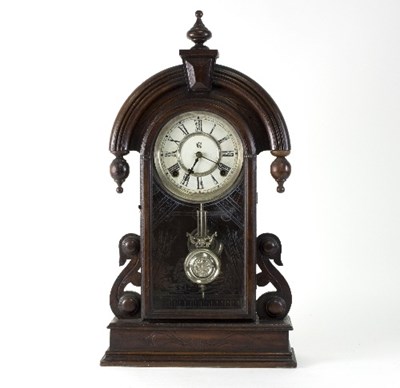 Lot 742 - A German mantel clock in an arched case, 59cm...