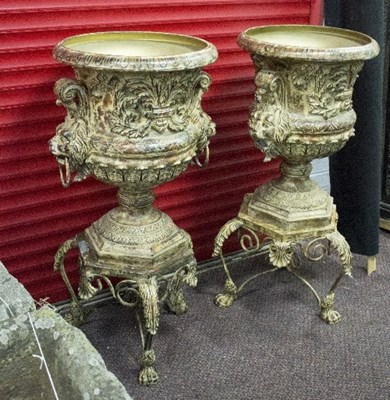 Lot 750 - A pair of campana shaped urns with lion masks...