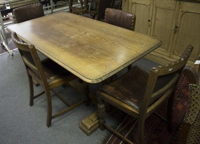 Lot 763 - An oak dining table carved baluster legs,...