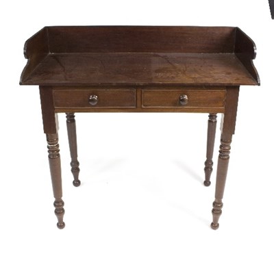 Lot 779 - A mahogany washstand with scroll end gallery...