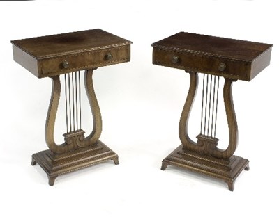 Lot 787 - A pair of mahogany occasional tables with lyre-...