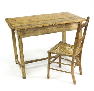 Lot 806 - A pine kitchen table, 108cm long, and a caned...