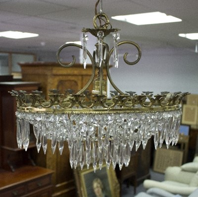 Lot 813 - An oval gilt metal two-tier chandelier, with...