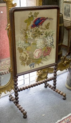 Lot 820 - A Victorian rosewood fire screen, the glazed...