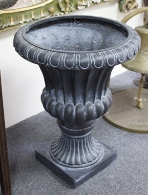 Lot 828 - A composite decorative planter of Classical...