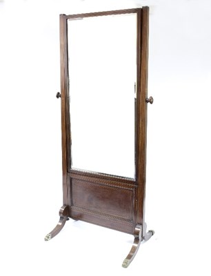 Lot 829 - A Regency style mahogany framed cheval mirror...