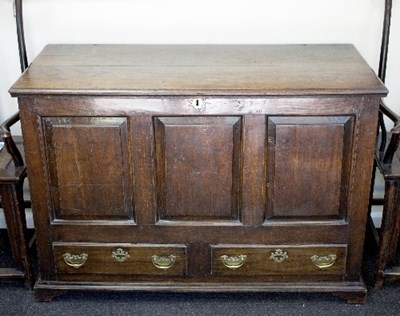 Lot 830 - A George III oak mule chest with hinged cover,...