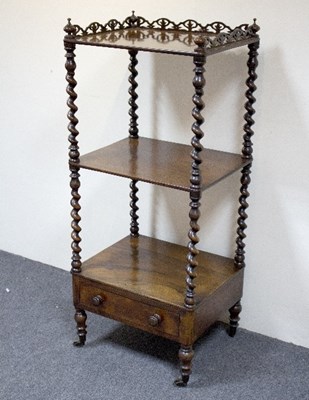 Lot 842 - A Victorian rosewood three-tier whatnot with...