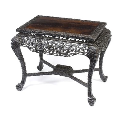 Lot 844 - A 19th Century Chinese hardwood centre table,...