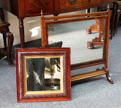 Lot 866 - An Edwardian mahogany swing frame mirror,...