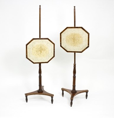 Lot 897 - A pair of early 19th Century mahogany pole...