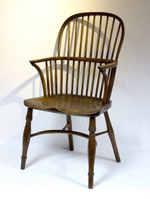 Lot 902 - A stick back armchair with elm seat on turned...