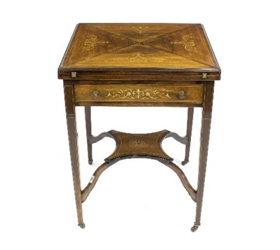 Lot 905 - An Edwardian mahogany envelope card table,...