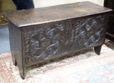 Lot 914 - A late 17th Century oak chest with carved...