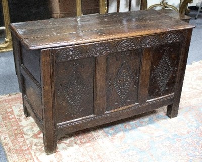 Lot 921 - An 18th Century oak coffer with plain plank...