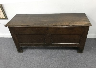 Lot 924 - An 18th Century oak chest, the hinged cover...