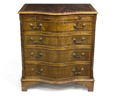 Lot 926 - A mahogany serpentine front chest of four long...