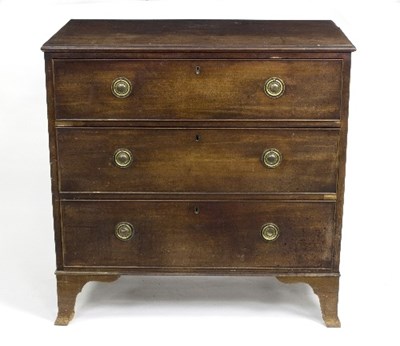 Lot 927 - An early 19th Century mahogany chest of three...