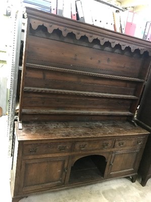 Lot 948 - An early 19th Century oak dresser with shelves...