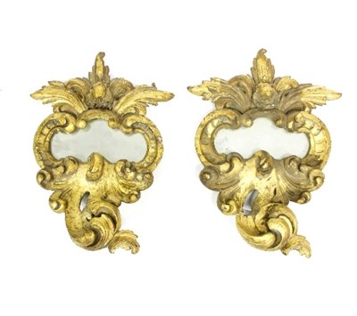 Lot 970 - A pair of Italian carved giltwood wall mirrors...