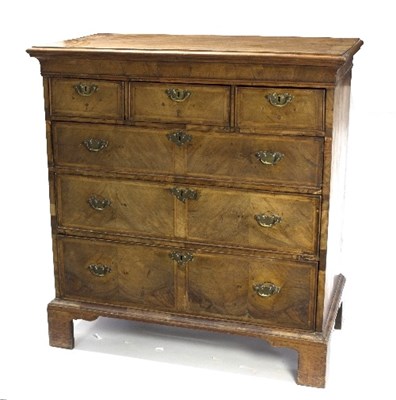 Lot 986 - An 18th Century walnut chest (alterations),...