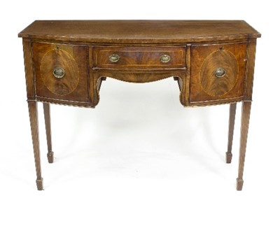 Lot 993 - A Regency style mahogany bowfront sideboard,...