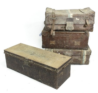 Lot 996 - A quantity of trunks to include a tin trunk,...