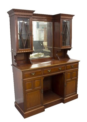 Lot 1000 - A mahogany dresser, the mirror-back flanked by...